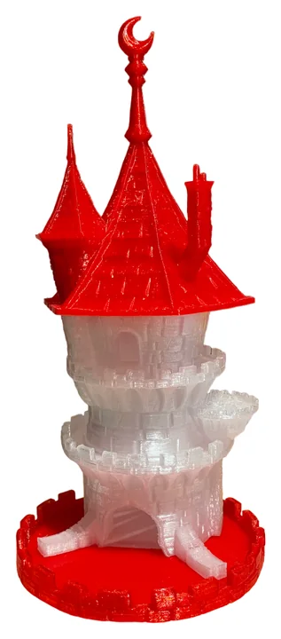 Piccolo castello decorativo con torri rosse, corpo chiaro e base rossa