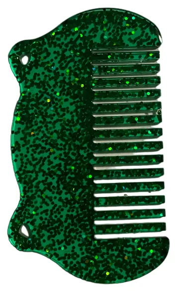 Piccolo pettine verde glitterato con bordo sagomato